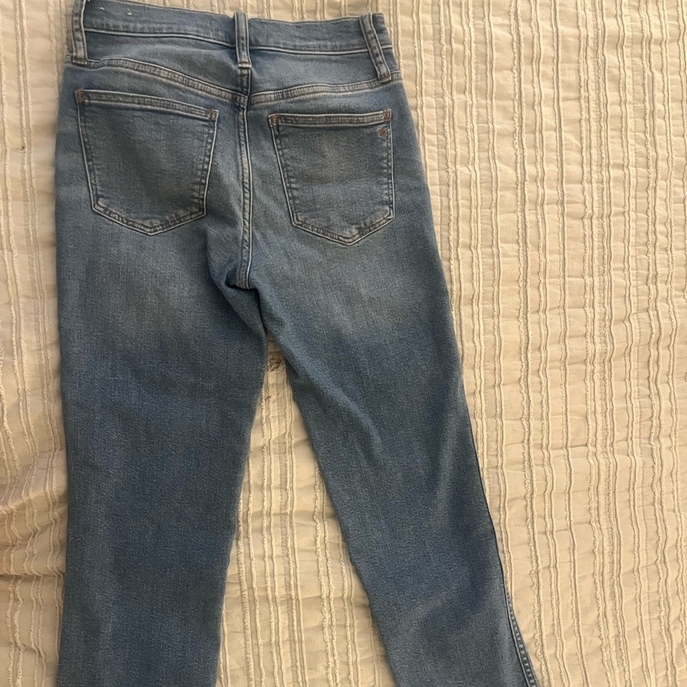 Madewell stovepipe style jeans.